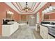 Elegant bathroom featuring a soaking tub, a glass-enclosed shower, and dual vanities at 559 Fairway Dr, Woodstock, GA 30189