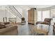 Elegant living room featuring hardwood floors, neutral furniture, and abundant natural light at 559 Fairway Dr, Woodstock, GA 30189