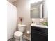 Bathroom featuring a patterned floor, a mirror and a sink at 202 Porter Ln, Jonesboro, GA 30236