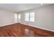 Inviting living room with hardwood floors, neutral paint, recessed lights and natural light at 202 Porter Ln, Jonesboro, GA 30236