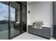 Balcony boasts an outdoor grill, sleek cabinetry, and sliding glass doors at 2425 Peachtree Rd # 1806, Atlanta, GA 30305