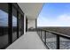Spacious balcony features glass railings and a built-in grill, perfect for outdoor cooking and entertaining at 2425 Peachtree Rd # 1806, Atlanta, GA 30305