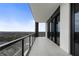 Relax on the expansive balcony with glass railings, offering stunning city views and ample space at 2425 Peachtree Rd # 1806, Atlanta, GA 30305