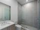 Modern bathroom with a glass-enclosed shower, sleek vanity, and tile surround at 2425 Peachtree Rd # 1806, Atlanta, GA 30305