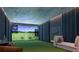 A luxury home golf simulator room includes a projector, screen, seating and putting green at 2425 Peachtree Rd # 1806, Atlanta, GA 30305