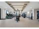 Well-equipped gym with modern exercise machines and large windows at 2425 Peachtree Rd # 1806, Atlanta, GA 30305