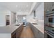 A modern kitchen features an island, stainless steel appliances, and plenty of counter space at 2425 Peachtree Rd # 1806, Atlanta, GA 30305