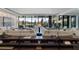 Modern resident lounge with stylish seating and views of the outdoors at 2425 Peachtree Rd # 1806, Atlanta, GA 30305