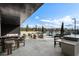 Outdoor lounge area with comfortable seating and an outdoor kitchen at 2425 Peachtree Rd # 1806, Atlanta, GA 30305