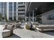 Elegant outdoor lounge area with stylish seating arrangements and views of the surrounding landscape at 2425 Peachtree Rd # 1806, Atlanta, GA 30305