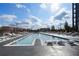 Outdoor pool featuring city views, tanning chairs and clear blue skies at 2425 Peachtree Rd # 1806, Atlanta, GA 30305