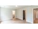 Bedroom with wood floors and views to bathroom and walk in closet at 2646 Radvell Ct, Decatur, GA 30034