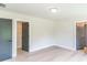 Bright bedroom with wood floors, multiple closets and neutral color palette at 2646 Radvell Ct, Decatur, GA 30034