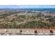 Wide aerial view of a new housing development surrounded by trees and green spaces at 414 Montclair Ct, Woodstock, GA 30188