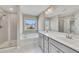 Bright bathroom with a soaking tub, shower, and a double sink vanity at 414 Montclair Ct, Woodstock, GA 30188