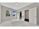 Bedroom with neutral walls, plush carpet and bright natural light at 414 Montclair Ct, Woodstock, GA 30188