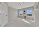 Cozy bedroom with neutral walls, carpet, and plenty of natural light at 414 Montclair Ct, Woodstock, GA 30188