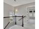 Hallway with stairs and view into another room at 414 Montclair Ct, Woodstock, GA 30188