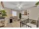 Cozy bedroom with neutral colors, a crib, and charming decorative accents at 122 Lakepointe Court Ct, Stockbridge, GA 30281