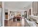 A dining room and kitchen area with hardwood floors and bright natural light at 122 Lakepointe Court Ct, Stockbridge, GA 30281