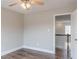 Bedroom with hardwood floors and an entrance to the hallway at 190 Holcomb Ct, Fayetteville, GA 30215