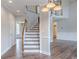 Foyer featuring stairs to the upper level, and an entrance to the bathroom at 190 Holcomb Ct, Fayetteville, GA 30215