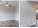 Living Room showcases light-colored walls, hardwood flooring, a ceiling fan, and modern trim work at 190 Holcomb Ct, Fayetteville, GA 30215