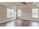 Spacious main bedroom with coffered ceilings and hardwood floors at 190 Holcomb Ct, Fayetteville, GA 30215