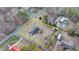 Aerial view of large lot, with an older house bordered in yellow at 2111 Jade Dr, Canton, GA 30115