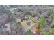 Bird's eye view of the lot with house and outbuildings outlined in yellow at 2111 Jade Dr, Canton, GA 30115