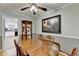 Cozy dining room features hardwood floors, a china cabinet, and a painting at 2111 Jade Dr, Canton, GA 30115