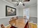 Dining room with a large table, hardwood floors, and plenty of natural light at 2111 Jade Dr, Canton, GA 30115