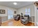 Comfortable living room with hardwood floors and dual recliner seating at 2111 Jade Dr, Canton, GA 30115