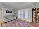 Comfortable living room with shutters, traditional decor, and a neutral color palette at 2111 Jade Dr, Canton, GA 30115