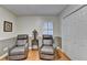 Relaxing living room area featuring a closet and hardwood floors at 2111 Jade Dr, Canton, GA 30115