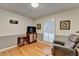 Cozy living room with hardwood floors and window with natural light at 2111 Jade Dr, Canton, GA 30115