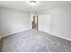 Spacious bedroom with neutral paint, carpet, and ample closet space at 3160 Sable Trl, Atlanta, GA 30349