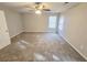 Spacious bedroom with neutral walls, carpet, and a ceiling fan at 3160 Sable Trl, Atlanta, GA 30349