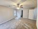 Bedroom featuring neutral walls, carpet, and a ceiling fan at 3160 Sable Trl, Atlanta, GA 30349