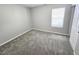 Bright bedroom with neutral walls and carpet at 3160 Sable Trl, Atlanta, GA 30349