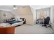 Bedroom with a sloped ceiling, ceiling fan, and two beds at 10635 N Edgewater Pl, Johns Creek, GA 30097