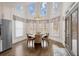 Bright breakfast nook features a modern light fixture and large windows at 10635 N Edgewater Pl, Johns Creek, GA 30097