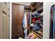 Well-organized closet with custom shelving and storage at 10635 N Edgewater Pl, Johns Creek, GA 30097