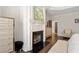 Cozy main bedroom with a fireplace and neutral decor at 10635 N Edgewater Pl, Johns Creek, GA 30097