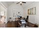 Office with built-in shelving and a view to the exterior at 10635 N Edgewater Pl, Johns Creek, GA 30097