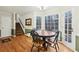 Dining Area features wood flooring, large windows, and a door to the outside at 3417 Starwood Sw Trl, Lilburn, GA 30047