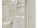 Bathroom featuring a white vanity, mirror, and a shower-tub combo at 3817 Paces Ferry West, Atlanta, GA 30339