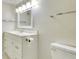Bright bathroom featuring updated lighting, vanity, and fixtures at 3817 Paces Ferry West, Atlanta, GA 30339