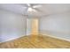Bedroom with a ceiling fan and wood floors at 3817 Paces Ferry West, Atlanta, GA 30339