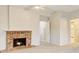 Cozy living room with brick fireplace and doorway to hallway at 3817 Paces Ferry West, Atlanta, GA 30339